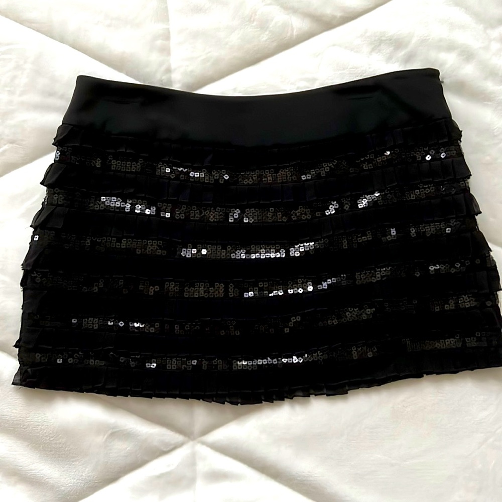 Black sequin and ruffle mini skirt